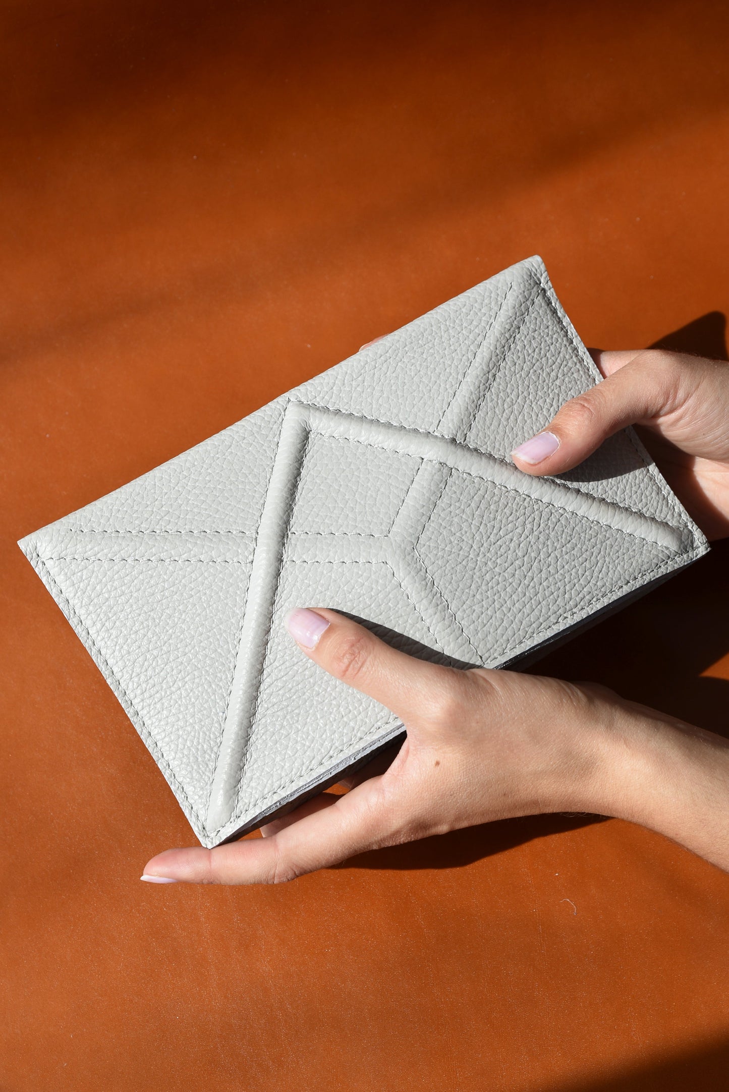 FACET clutch with Venice Strap